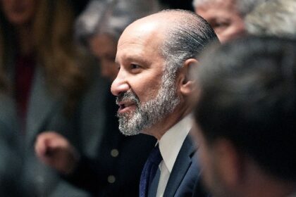 US tariff exemptions for electronic devices are "temporary," says Commerce secretary.