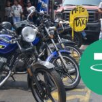What was your experience of riding a motorcycle taxi in Venezuela and paying with USDT?